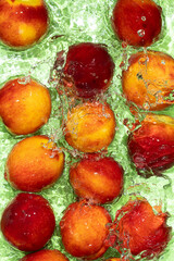 Fresh Peaches in Water. Top View Composition with Water Movement.