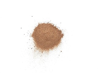 Pile of cinnamon powder isolated on white background, top view 