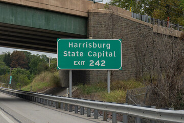 sign for Exit 242 from the Pennsylvania Turnpike I-76 for the State Capital Harrisburg, PA