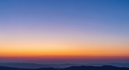 Serene Sunrise Over Mountain Ranges
