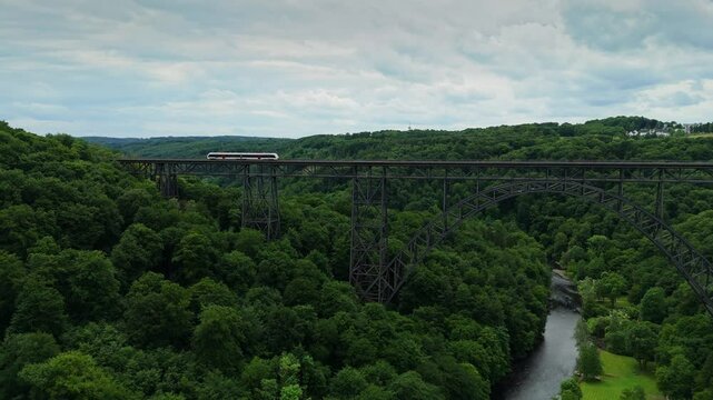 Wide Aerial View of Mungstener Brucke with Passenger Train in Germany