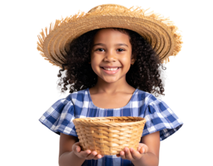 A joyful young girl in a straw hat smiles warmly while holding a small woven basket.