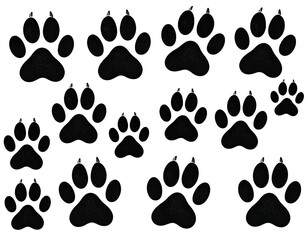 Fototapeta premium A captivating pattern of dark animal paw prints with visible claws creates a striking visual texture.