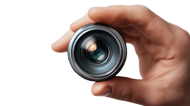 A hand holding a camera lens, highlighting the intricate details and design of the lens against a white background. - Powered by Adobe