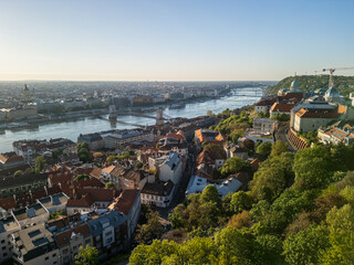 Aerial sunrise photo from Fisherman's Bastion in Budapest showing the Danube River, Chain Bridge,...
