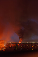 The city is on fire. A mushroom cloud of smoke rises above the city after an explosion. Burning...