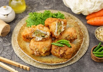 Tahu Isi. Stuffed tofu is known as fried food in the form of brown tofu filled with various fillings.