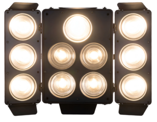 A powerful array of bright, warm lights illuminates the scene with intense radiance.