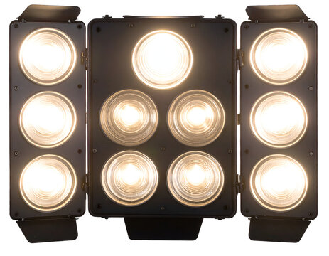 A powerful array of bright, warm lights illuminates the scene with intense radiance.