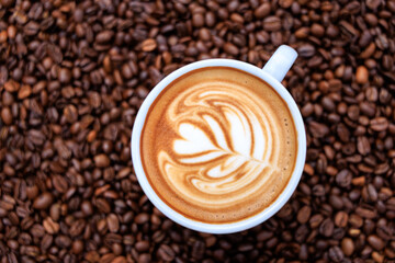 cappuccino white cup and roasted coffee beans backgrounds abstrack