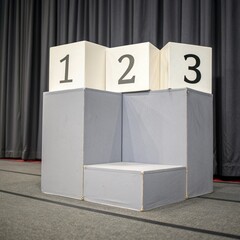 award podium on grey background