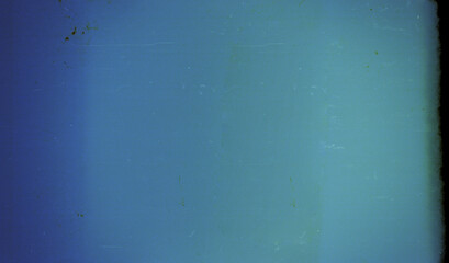 Blank grained film strip texture background with heavy grain, dust and light leak