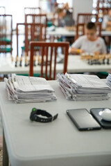 Match paperwork and equipment at chess event