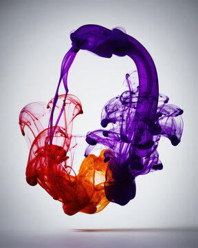Vibrant swirling clouds of purple, red, and orange ink create dynamic abstract pattern