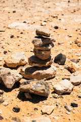 Meditative stack of stones in the stillness of the desert. Balanced stack of stones