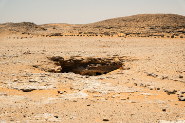White rock formations and sand dunes in Egypt's White Desert, natural desert landscape	