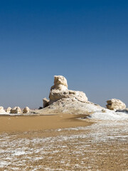 White rock formations and sand dunes in Egypt's White Desert, natural desert landscape	