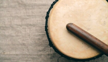 A close-up view of a drum and drumstick, symbolizing rhythm, heritage, and the vibrant traditions of African descent. This image evokes the spirit of music, culture, and community celebrations.