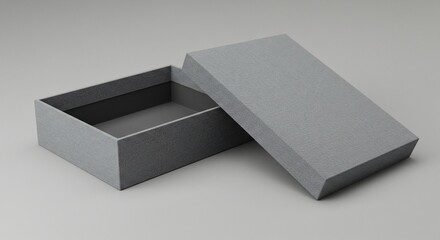 Open Gray Box with Textured Surface and Angled Lid on Neutral Background