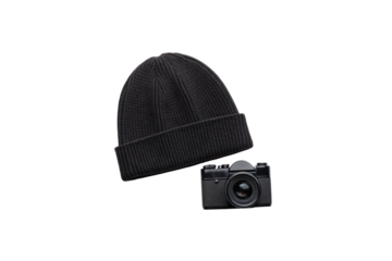 Black knit beanie with vintage film camera, photographer accessories combination, isolated on a transparent background