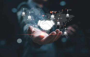 Hand shaking with human icon on world map for worldwide business deal agreement and partnership...