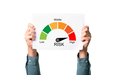 Businessman holding white paper with risk level indicator rating since low to high for Risk management and assessment concept.