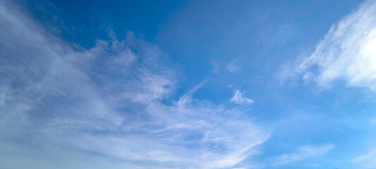 Sky is blue and clear with no clouds. The sky is very bright and the sun is shining. Blue sky with...