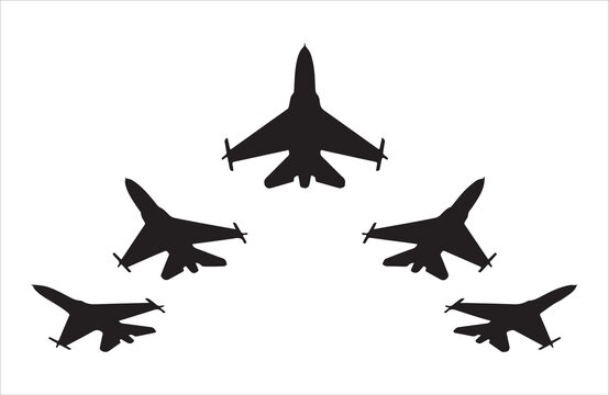 Five fighter jets flying in formation silhouette