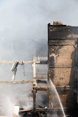Devastation in Kyiv after air strike shows damaged buildings and smoke on July 4, 2025