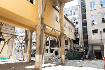 Destroyed buildings and aftermath of air strike in urban area