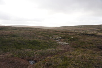 Fototapeta premium B29 OVEREXPOSED Crash Site, The Peak District, England – June 8 2022: A memorial site on the moorland landscape in The Peak District, England.