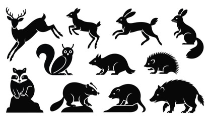 silhouette set of woodland animals including deer, rabbits, squirrel, owl, raccoon, beaver, and hedgehog isolated on white background