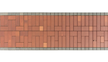 Red brick pavement with gray border in geometric pattern