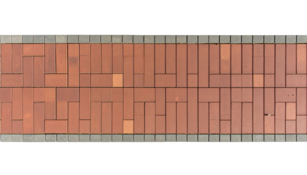 Red brick pavement with gray border in geometric pattern