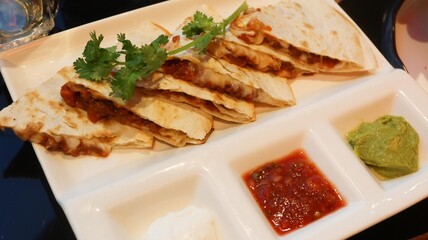close up of Chinese spicy soy sauce marinated slices of beef ox tongue on a white plate