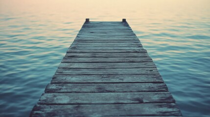 Tranquil wooden dock leading to serene water