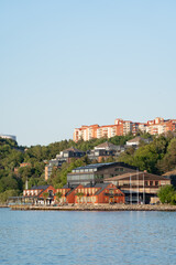 View from the west of Nacka Strand quay and water front area in Nacka outside Stockholm in late summer evening