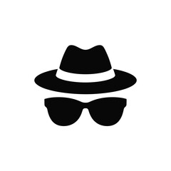 Black silhouette of a fedora hat and sunglasses representing a spy or detective