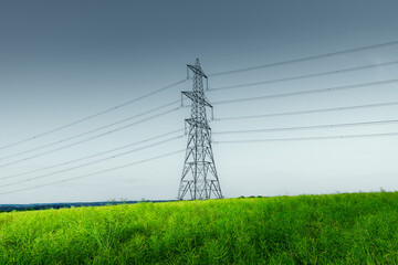 High-voltage grid lines across field