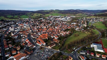 Aerial view around the city Schlüchtern, 36381 in Germany on a sunny spring day