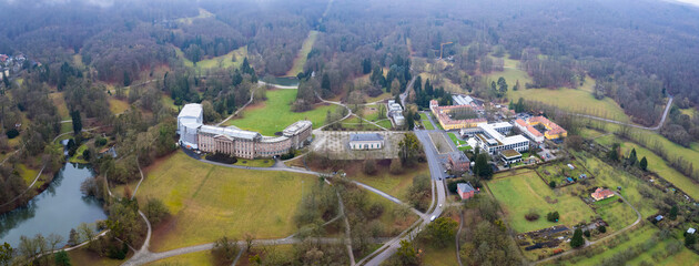 Aerial view of the city park around the city Kassel in Hessen, Germany on a cloudy day. in autumn	
