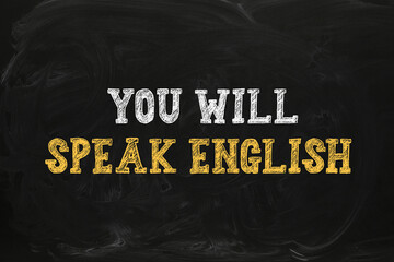 You Will Speak English inscription on black chalkboard. Language course