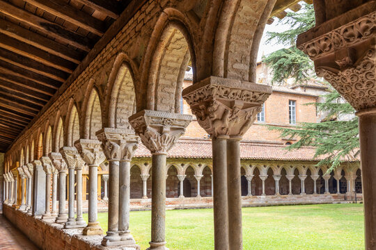 Cloister of Saint Pierre Abbey showing sculpted capitals and romanesque arches in Moissac, France - Powered by Adobe