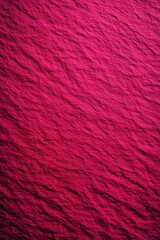 Crimson Fabric Texture: close up of wrinkled vibrant red material with diagonal folds