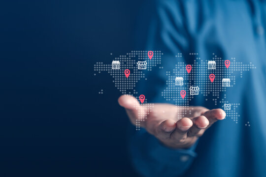 Franchise business expansion with store and map location pins representing global marketing, international strategy, retail network, multi-location branding, and worldwide distribution system.