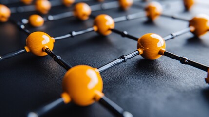 close-up of a molecular structure model with yellow spheres and black connectors for scientific research and education