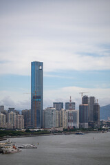 China Xiamen Urban Skyline with Tall Buildings and a River in the Foreground