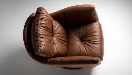 Obraz premium Cozy Brown Leather Armchair A Comfortable Retreat