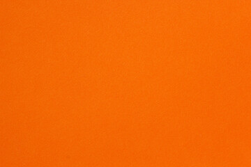 Bright orange paper texture background with subtle grain, perfect for creative designs, crafts, and modern visual projects.