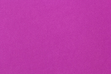 Purple paper texture background ideal for design, craft, and creative projects. Uniform color with soft grain and subtle variation.